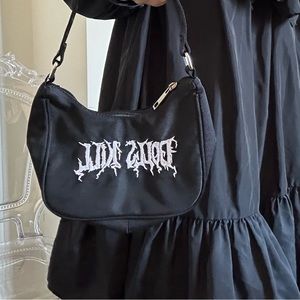 Dollskill Mini Black Handbag With Stitchwork Logo
